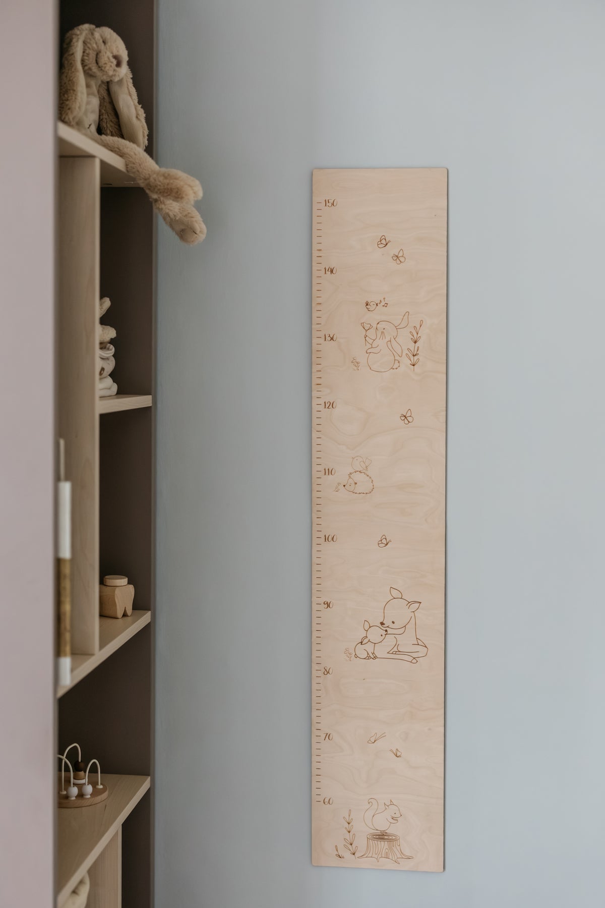 Groeimeter van hout met bosdieren