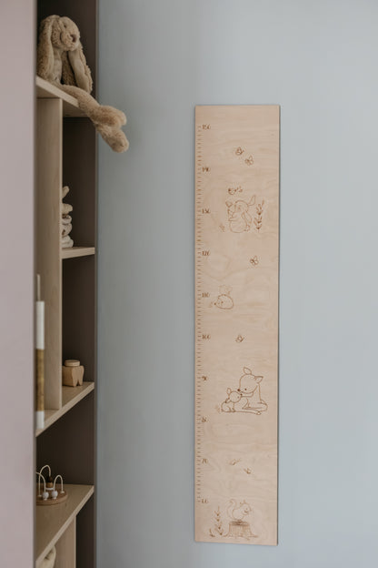 Groeimeter van hout met bosdieren