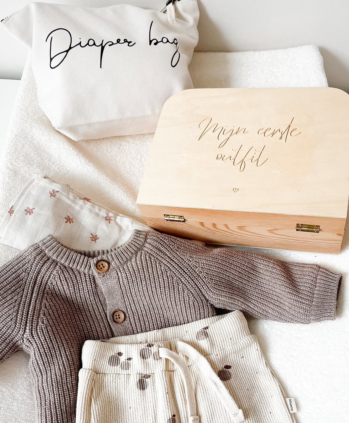 Kinderkoffertje eerste outfit