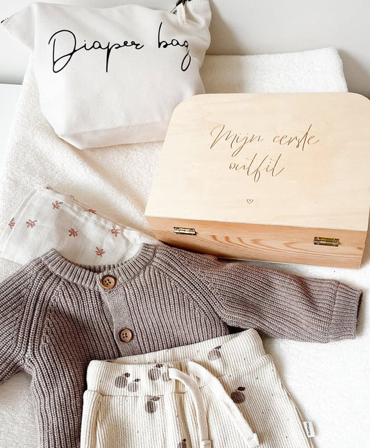 Kinderkoffertje eerste outfit